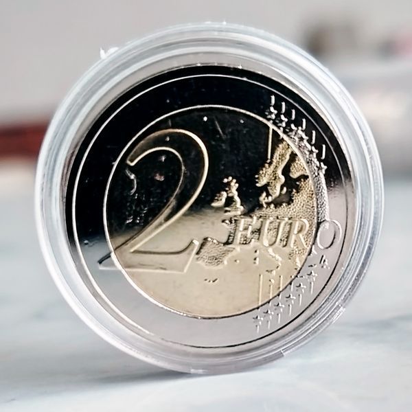 Монета номиналом 2 евро &laquo;Подсолнух для Украины&raquo;, Латвия, 2023 2EURO-LATVIA-2023 фото